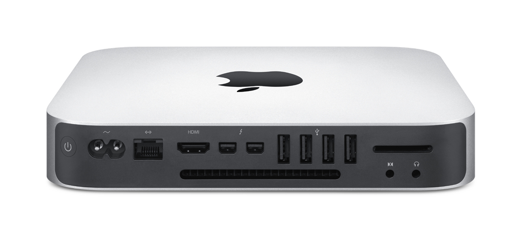 Silberner Apple Mac Mini mit schwarzem Apple-Logo und verschiedenen Anschlüssen auf der Rückseite.