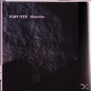 Album borító sötét háttérrel. A cím: 'Mutations'. A művész neve: 'Vijay Iyer'.