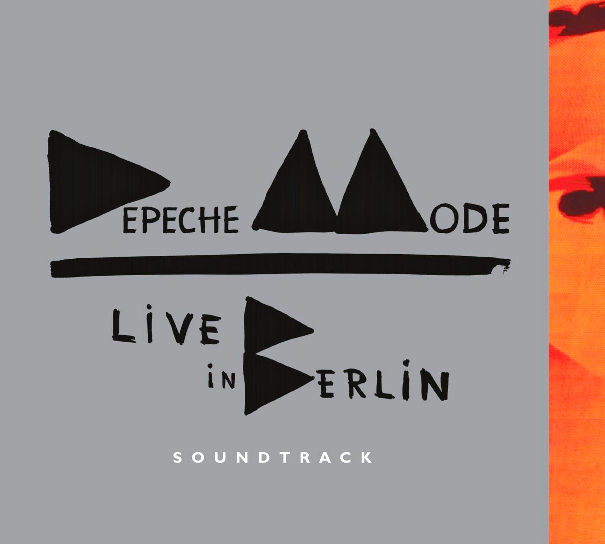 Pochette d'album : Depeche Mode, "Live in Berlin" en texte noir sur gris. Fond orange.