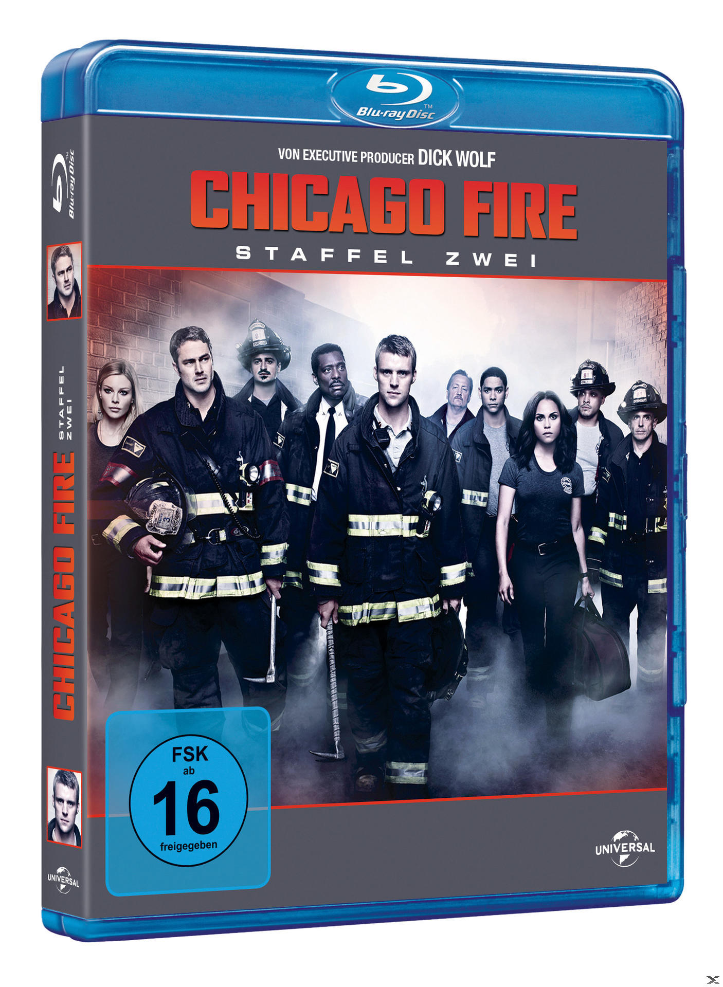 Blu-ray-Cover für 'Chicago Fire'. Gruppe von Feuerwehrleuten mit einem Gebäude im Hintergrund.