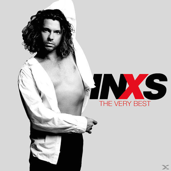 Mann mit offenem Hemd. Albumtitel: INXS The Very Best. Grauer Hintergrund.