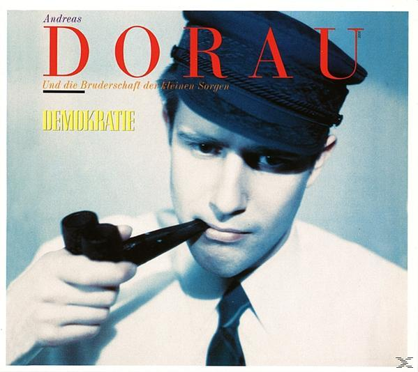 Albumcover mit einem Mann, der eine Pfeife hält, und dem Titel 'DEMOKRATIE'.