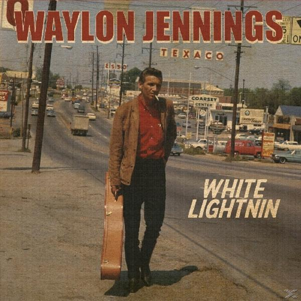 Albumcover mit Waylon Jennings. Er hält einen Gitarrenkoffer an einer Straße mit Autos. Titel: White Lightnin'.