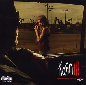 Albumcover mit einem Mädchen, das einen Mann im Auto anschaut, Ölbohrtürme im Hintergrund.