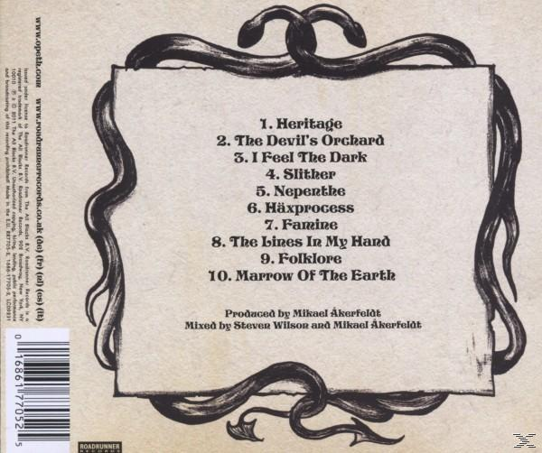 Albumcover mit Text: Titelliste, Barcode und ein Rahmen mit Schlangenillustrationen.