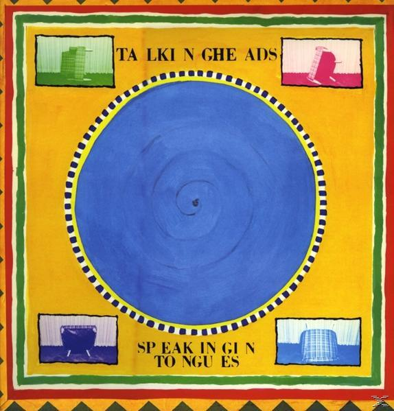 Albumcover mit blauem Kreis, vier kleinen Quadraten und Text. Gelb, grün und rot dominieren.