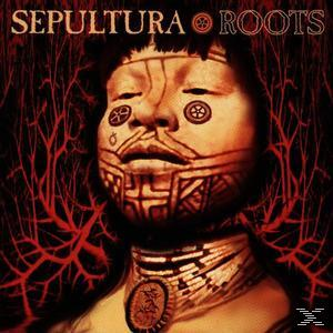 Albumcover mit stilisiertem Stammesgesicht. Der Künstler ist Sepultura und das Album ist Roots.