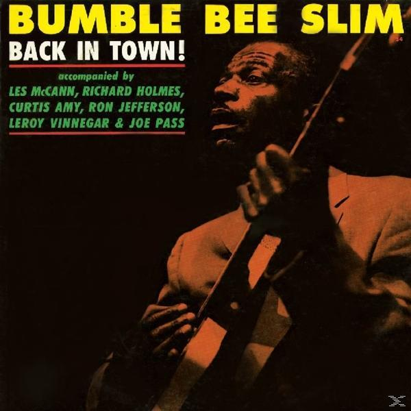 Albumcover mit einem Mann, der Gitarre spielt. Text ist sichtbar.