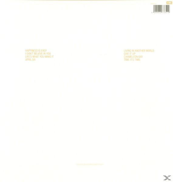 Album-Rückseite: ein weißer Hintergrund mit Titeln und Text, schlichtes Design, mit einem Logo unten.