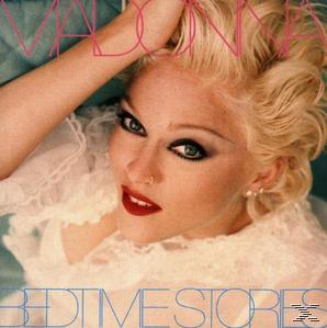 Madonna's Gesicht auf dem Albumcover. Sie hat blondes Haar und roten Lippenstift, Titel oben.