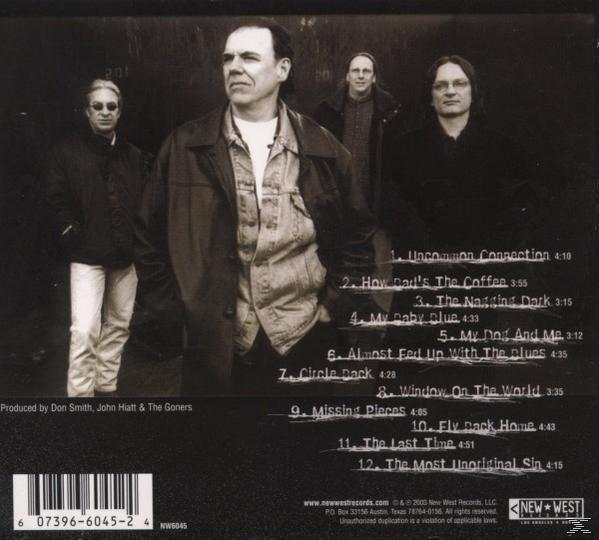 CD hátlapja négy férfival elöl. A számlista a jobb oldalon. Don Smith, John Hiatt és The Goners produceri munkája.