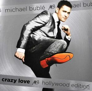Michael Bublé Albumcover, posiert in Anzug und Krawatte, ein Bein in der Luft, orangefarbener Schuh.