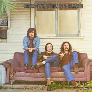 Drei Männer sitzen auf einem lila Sofa vor einem Haus, klassisches Albumcover.