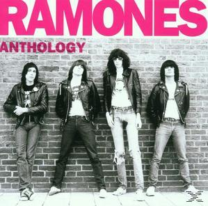 Ramones Anthology Albumcover. Vier Bandmitglieder vor einer Backsteinmauer, Titeltext ist rosa.