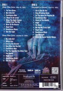 DVD-Cover mit Titellisten und Credits. Eine Hand ist sichtbar. Blau-weißer Hintergrund.