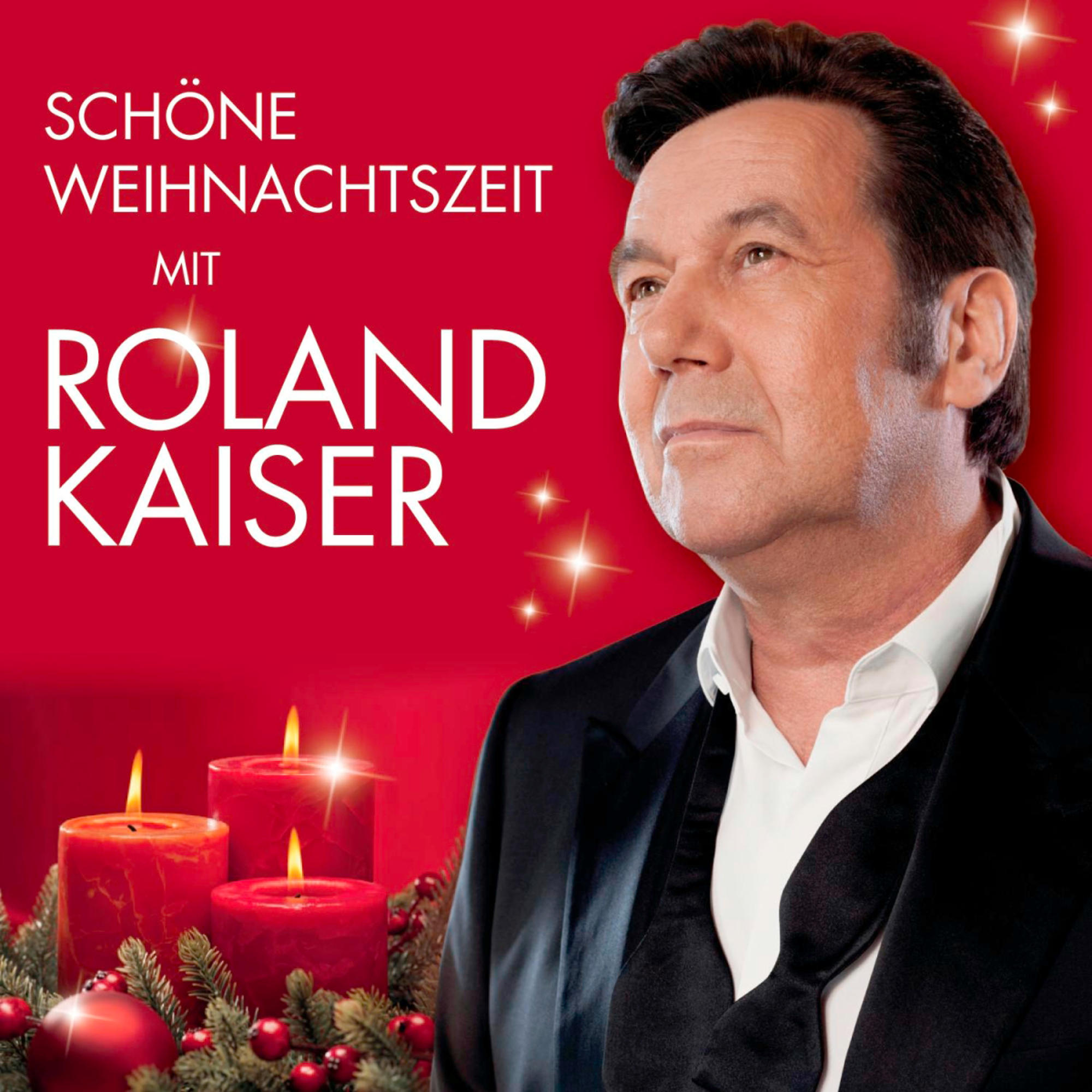 CD-Cover. Roland Kaiser, roter Hintergrund, Kerzen und Weihnachtsthema.