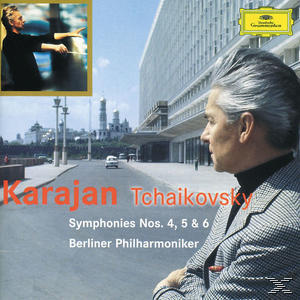 CD-Cover von Karajan beim Dirigieren, mit Stadtbild und goldgerahmtem Bild.