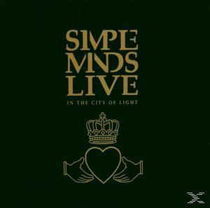Simple Minds Live Albumcover. Dunkelgrüner Hintergrund mit Bandnamen und Herzsymbol.