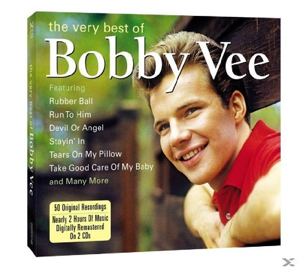Album borító egy mosolygó férfival. A cím és a kiemelt dalok fel vannak sorolva.