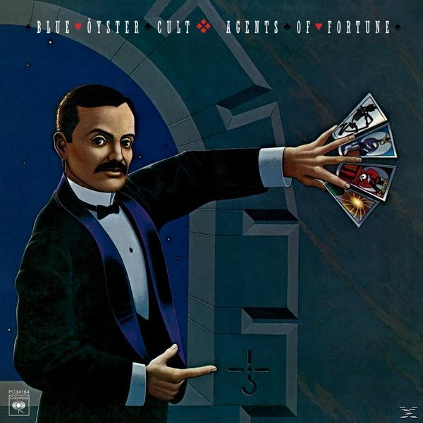 Album borító: Öltönyös férfi kártyákat tart. Cím: "Agents of Fortune".