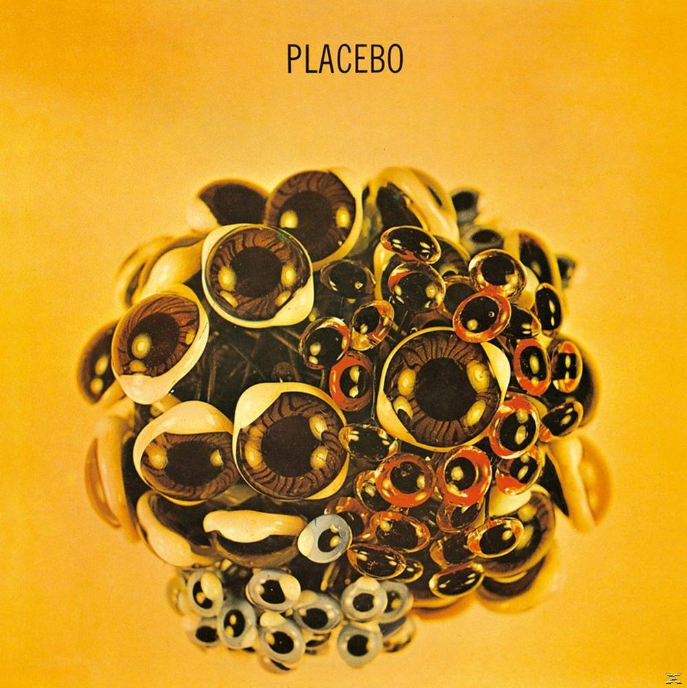 Albumhoes: Placebo. Groep ogen op een gele achtergrond. Artistiek.