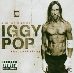 Albumcover: Iggy Pop, oben ohne, mit Tätowierungen und einem weißen Verband. Text: 'A Million In Prizes'.