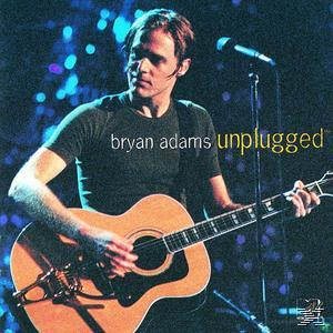 Bryan Adams spielt Gitarre auf der Bühne. Der Text 'unplugged' ist sichtbar.