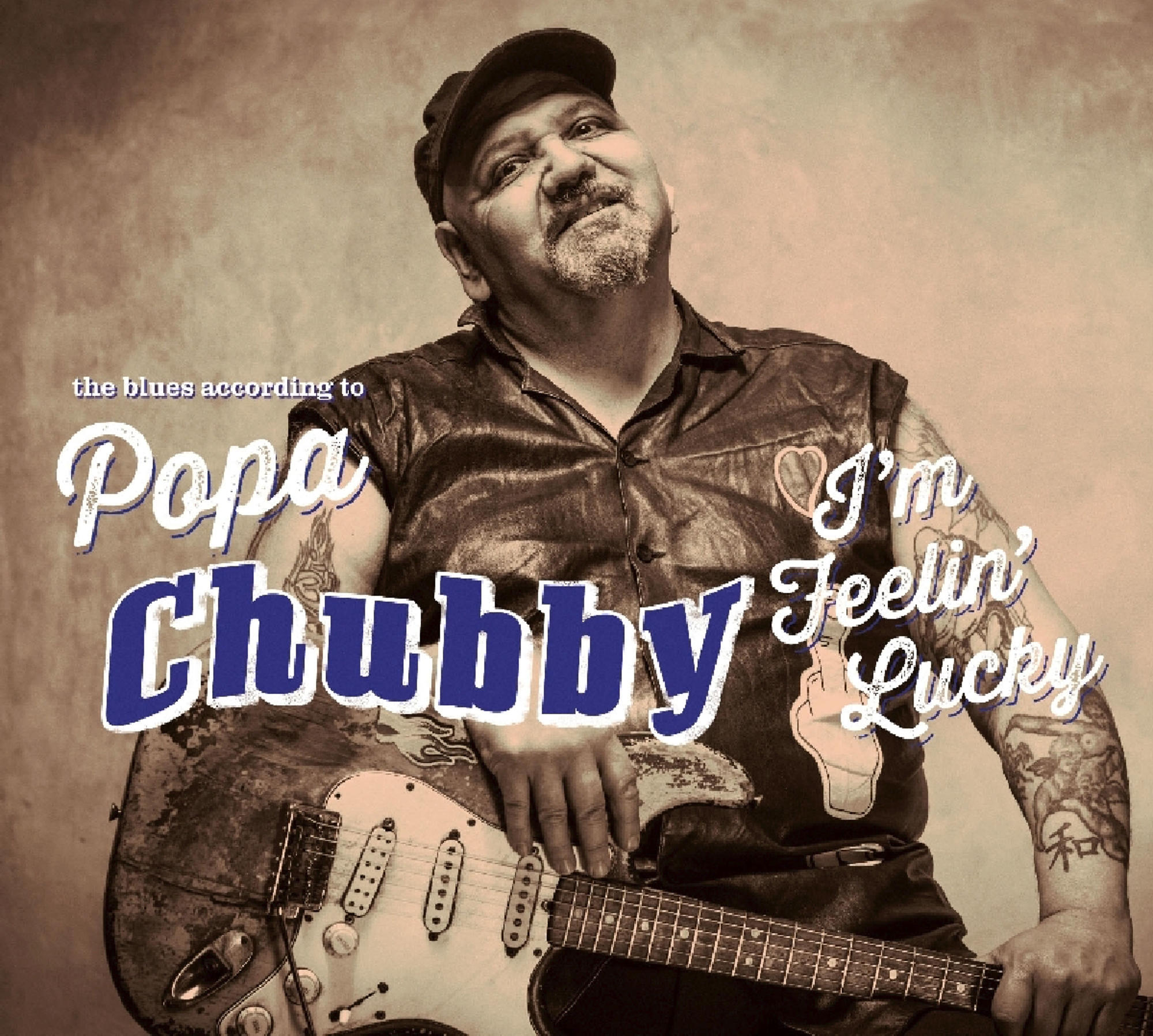 Albumcover: Popa Chubby hält eine Gitarre, mit dem Text 'I'm Feelin' Lucky'.