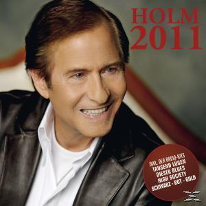 CD-Cover mit dem lächelnden Gesicht eines Mannes. Text: Holm 2011. Ein roter Kreis mit Text befindet sich unten rechts.