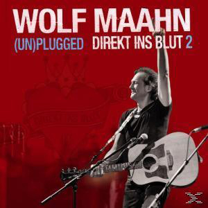 Albumcover mit einem Musiker, der singt und Gitarre spielt, mit rotem Hintergrund.