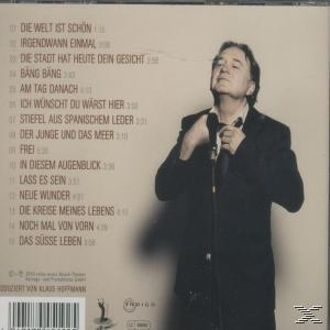 CD-Rückseite mit einem Mann in schwarzer Jacke und Songtiteln.