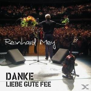 Albumcover. Ein Mann auf der Bühne mit Blumen, dem Publikum zugewandt. Der Titel lautet "Danke Liebe Gute Fee".