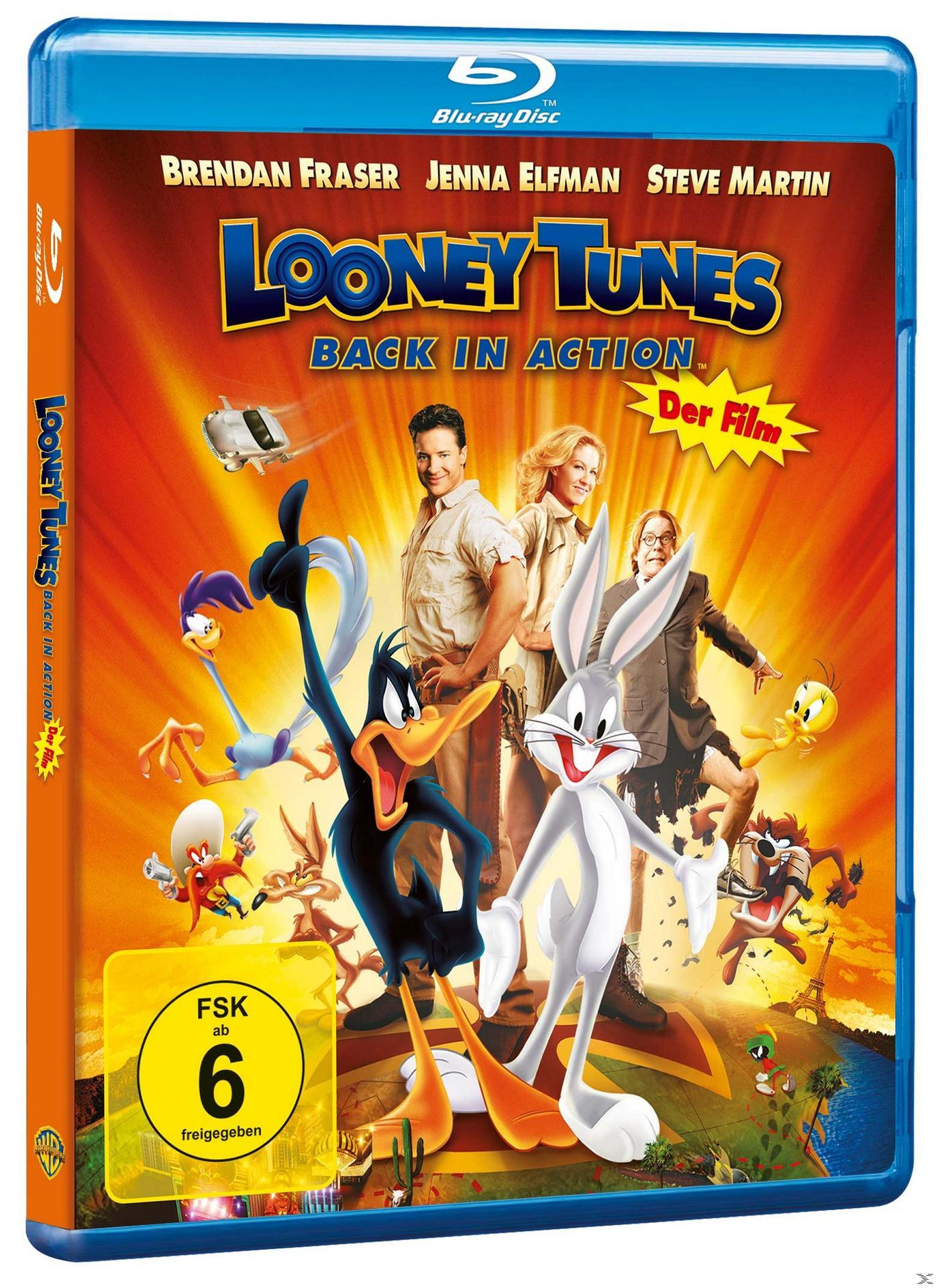 Looney Tunes DVD-Hülle. Bugs Bunny, Daffy Duck und andere Zeichentrickfiguren, mit Schauspielern im Hintergrund.