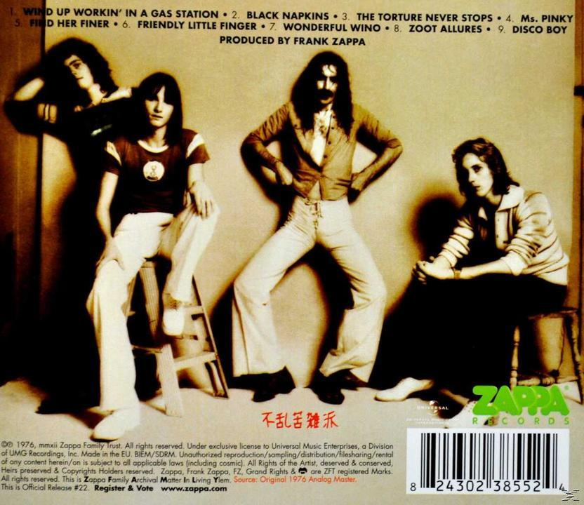 Zappa albumhoes. Bandleden zitten en staan, zwart-witte achtergrond.