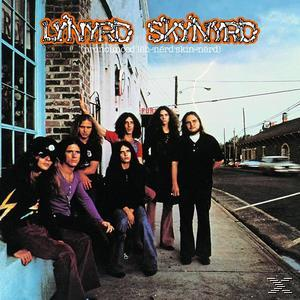 Album borító: Lynyrd Skynyrd együttes fotója. A zenekar egy épület előtt áll.
