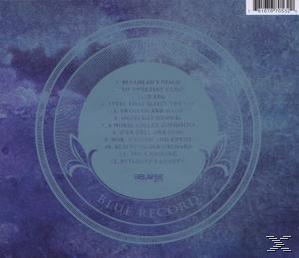 Albumcover der blauen Schallplatte mit kreisförmigem Design. Text enthält eine Liste von Liedern und 'Blue Record' in einem Kreis.