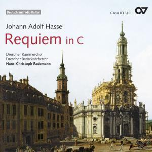 Albumcover mit einer Kirche und einer Stadt im Hintergrund. Text oben.