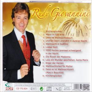 Albumcover mit einem Mann im Anzug. Eine Liste der Songs befindet sich auf der rechten Seite. Weihnachtsthema.