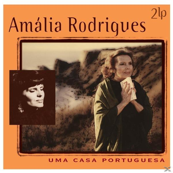 Amália Rodrigues albumborító fotója, szépia fotóval egy oldalsó dobozban, narancssárga kerettel.