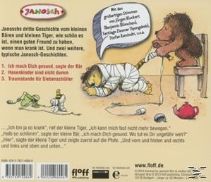 Cartoonbild: Bär verbindet Tigers Arm. Sprechblasen mit Stimmen. Andere Objekte wie Teekanne und Spielzeug sind vorhanden.