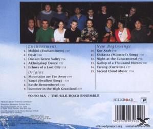 Albumcover: Gruppe von Leuten vor einer Landschaft. Text mit Songtiteln. Blaue und weiße Töne.