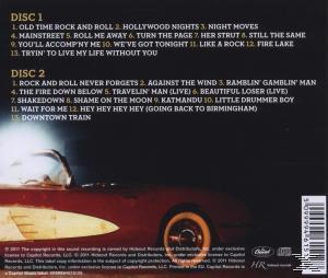 Rückseite einer CD mit einem Auto und Musiktitel. Titellisten sind auf weißem Hintergrund gedruckt.