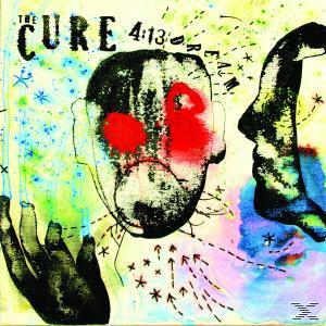 Albumcover mit zwei Gesichtern, eines mit roten Augen. Der Text enthält "THE CURE 4:13 DREAM".