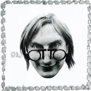 Schwarzweißfoto eines Mannes mit Brille, auf deren Gläsern das Wort "OTTO" steht.
