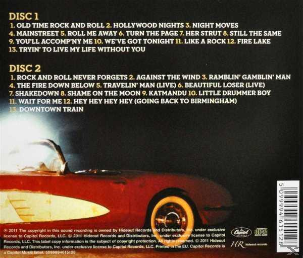 Album-Rückseite mit Titelliste. Bild eines roten Autos unten.