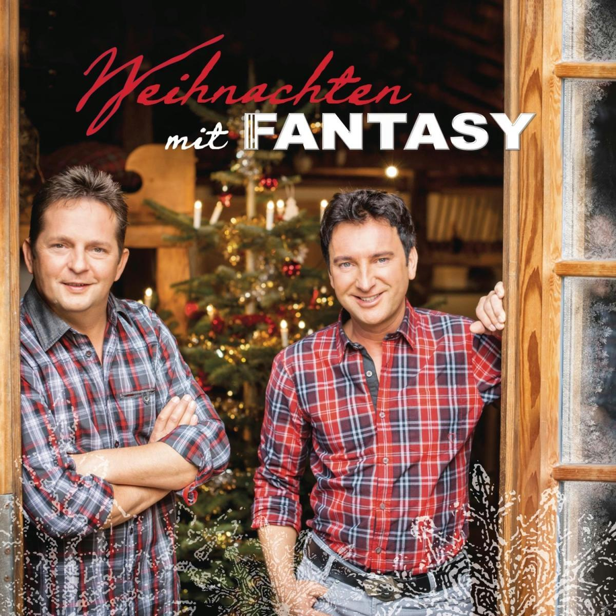 Albumcover mit zwei Männern vor einem Weihnachtsbaum. Text: „Weihnachten mit FANTASY“.
