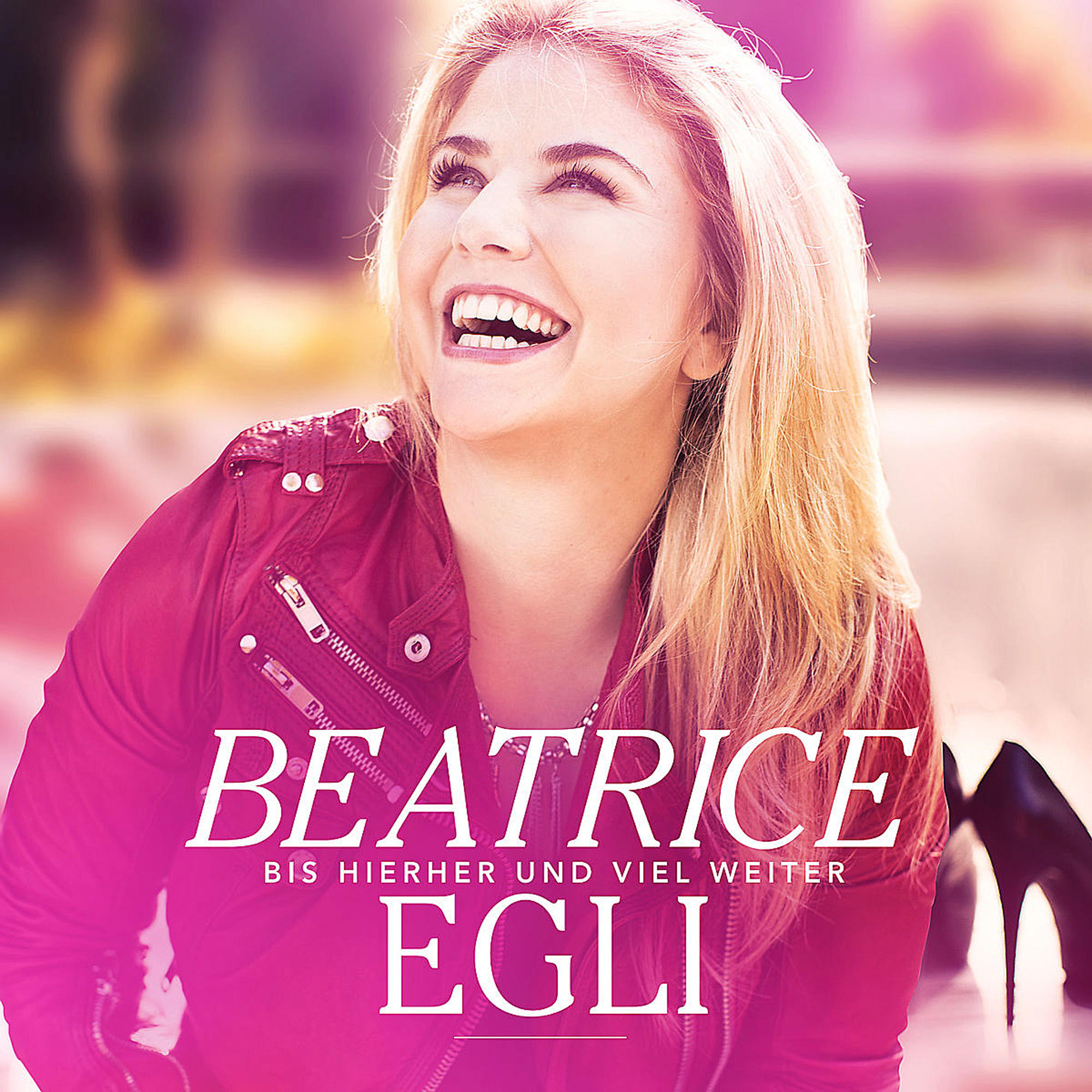 Albumcover: Frau mit blonden Haaren lacht. Titel: Beatrice Egli.