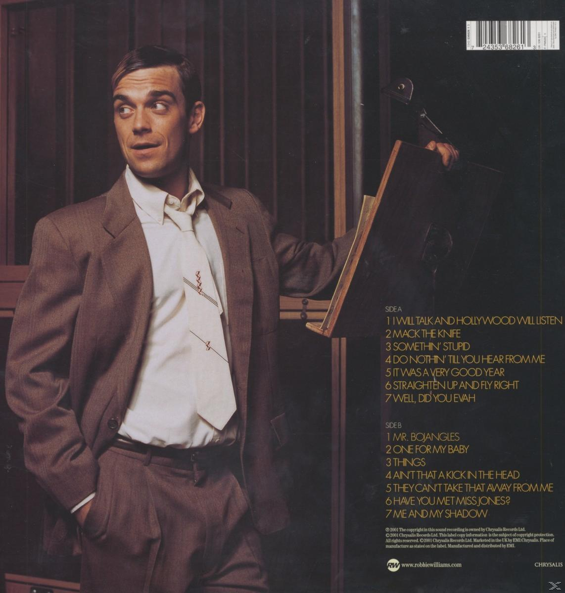 Robbie Williams Album-Rückseite. Er ist in einem Anzug und blickt nach links. Titelliste auf der rechten Seite.