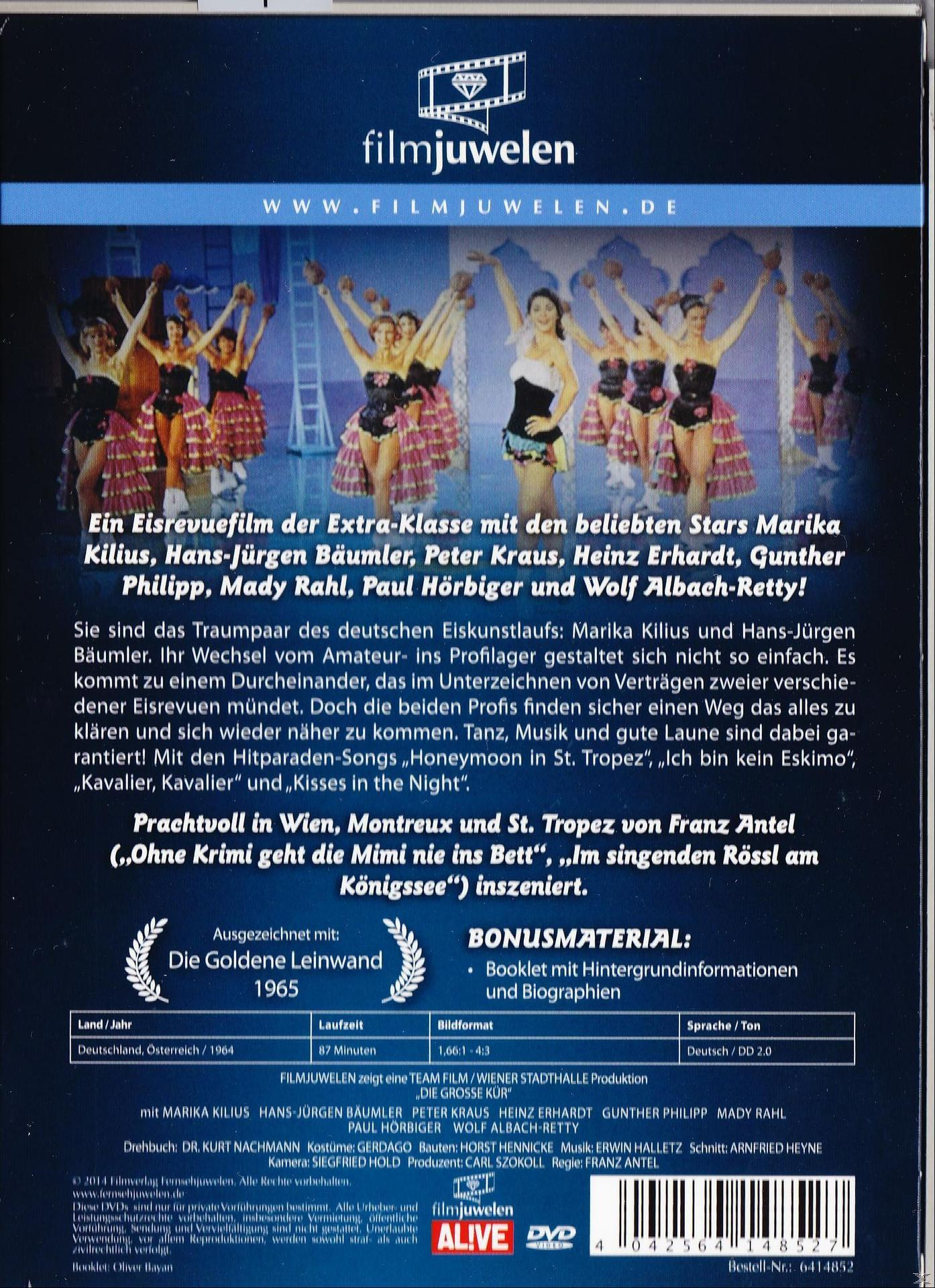 DVD-Cover mit einem Bühnenbild und Text über die Show und Bonusmaterial.