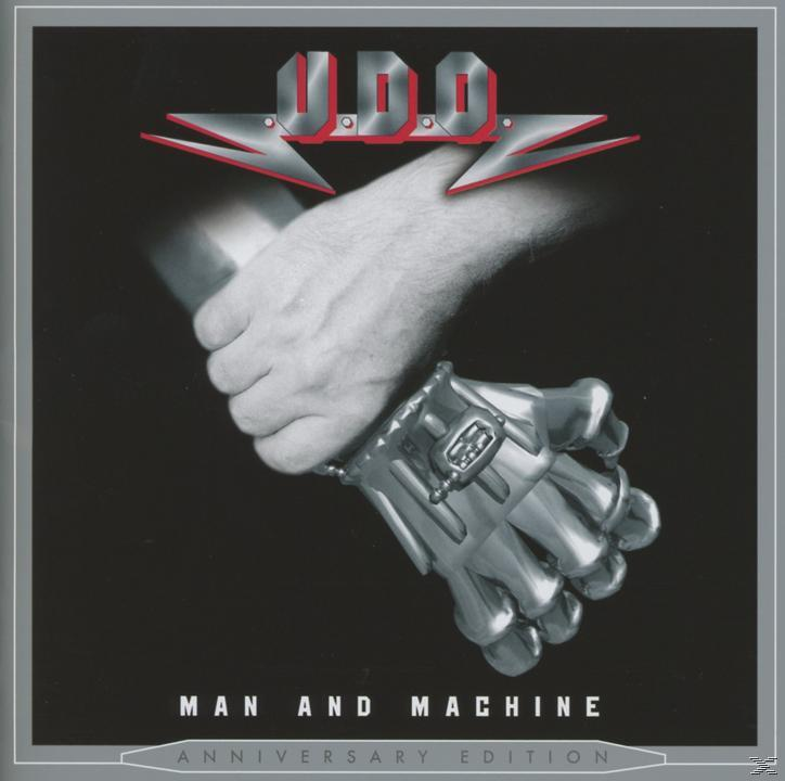 Albumcover mit einer Metallhand, die eine andere Hand hält. Text: U.D.O. Man and Machine.